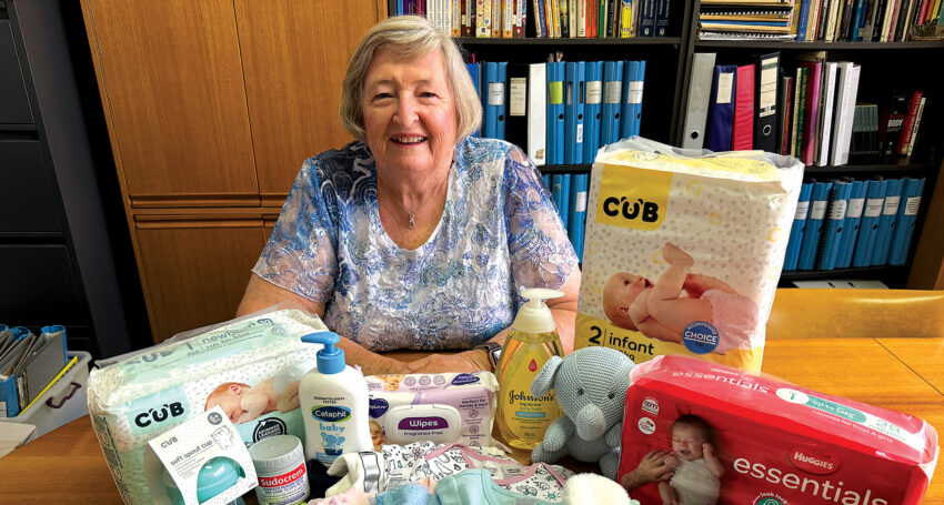 Birthline volunteer Kath Melbourne with donated baby products.