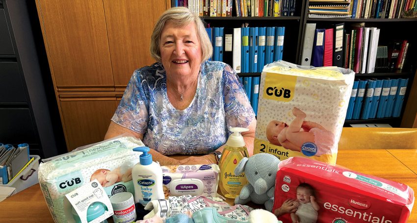 Birthline volunteer Kath Melbourne with donated baby products.