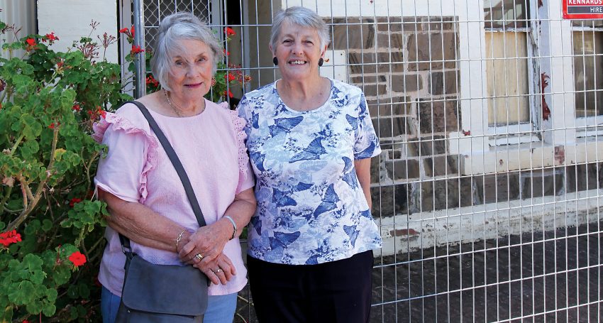 Margaret Morgan and Pat Murphy outside the fire damaged Murphy House.