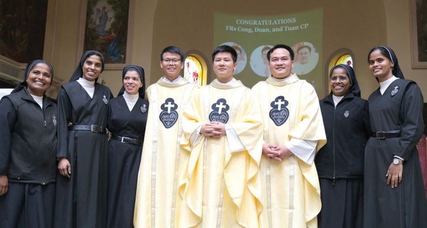 Srs Nithya, Mary Jasmine, Shiji, Jasmine and Lilly celebrate with Frs Joseph, James and Paul after their ordination last month.