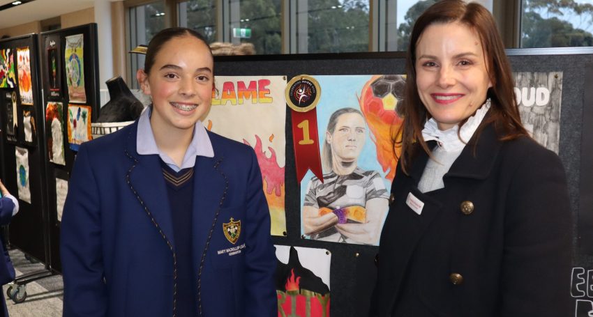 Mary MacKillop College student Ashlyn with her winning piece alongside Cressida O’Hanlon (Local Member for Dunstan).