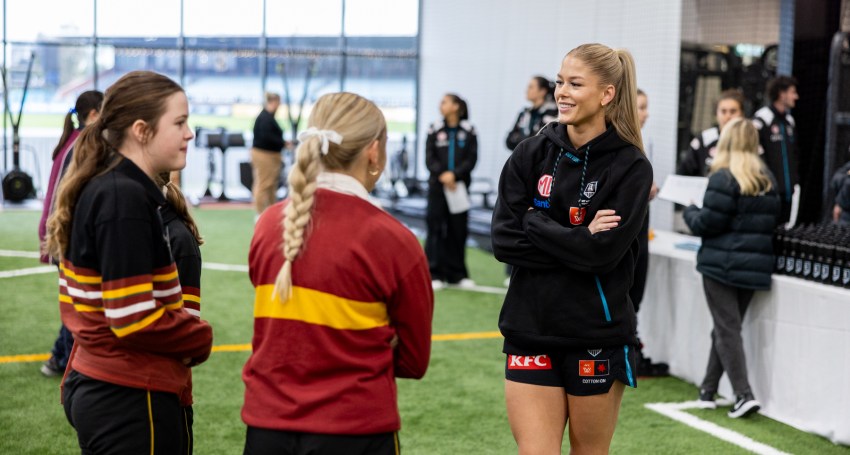 AFLW player Ashleigh Saint with Xavier College students during the Power to Thrive Program.