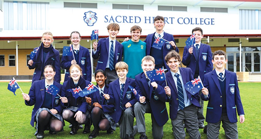 Jesse Moore (centre) with SHC students. Picture: Maya Thompson