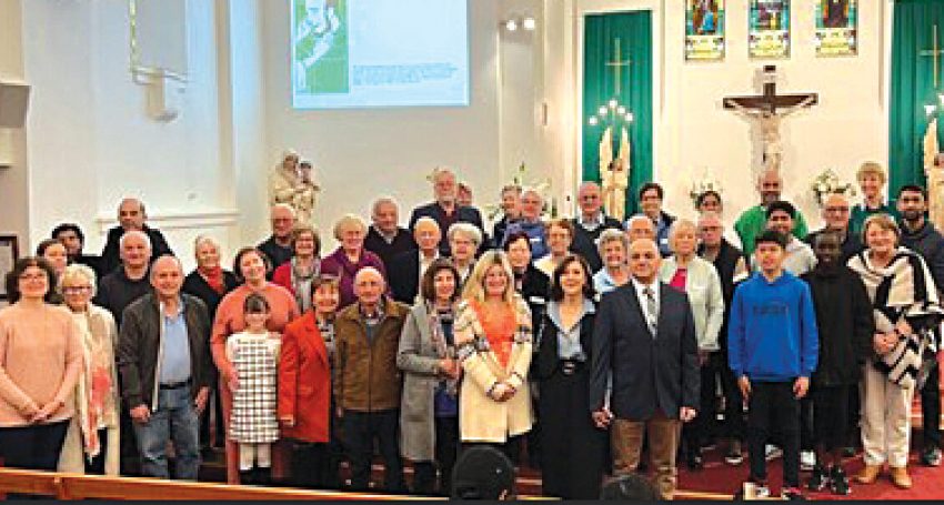 Past and present parishioners who received sacraments in Sacred Heart Chuch gathered after Mass on September 8.