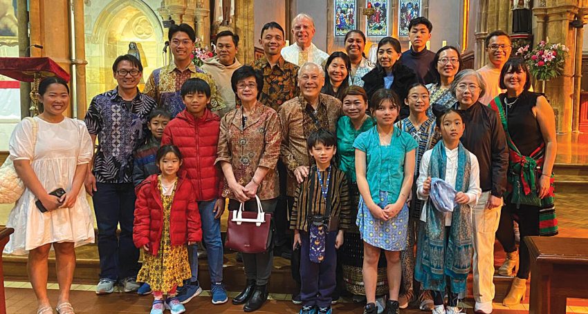 Fr Dean Marin with community leaders and members of the church at the 110th World Day of Migrant and Refugees.
