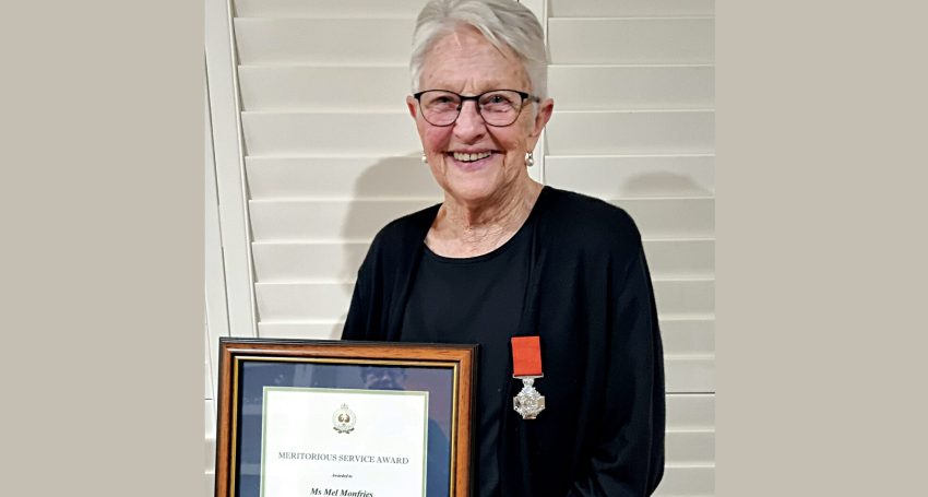 Mel Monfries with her Meritorious Award from the Department for Correctional Services.