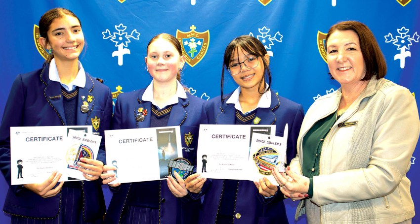 Mary MacKillop College Year 8 students Isla, Kaitlin and Francheska with school principal Sonia Nelson.