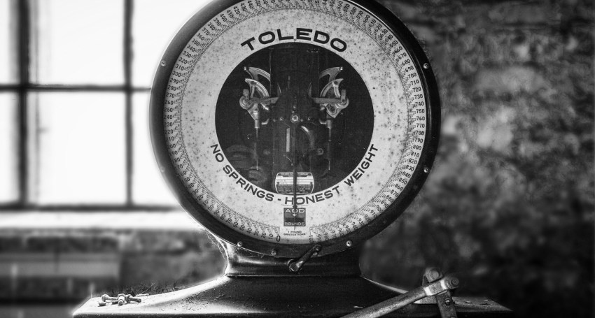 An old set of Toledo scales in black and white.